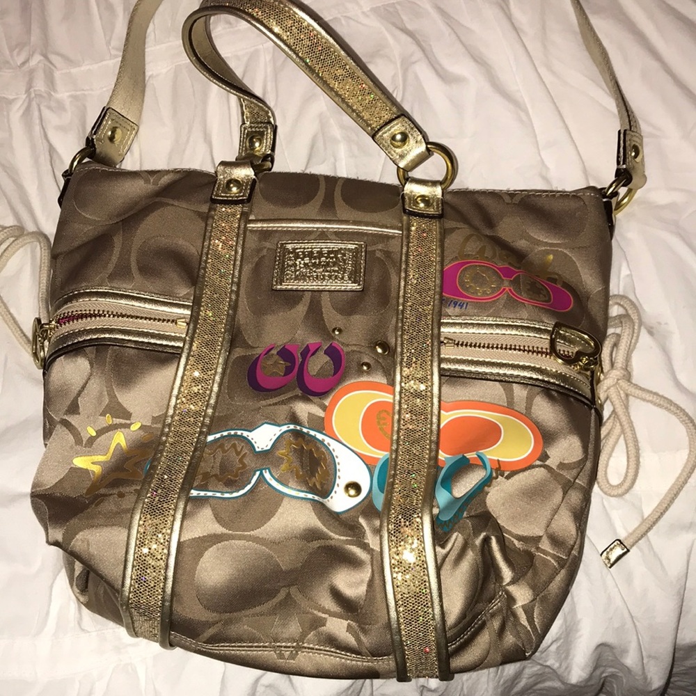 Light brown/gold coach purse